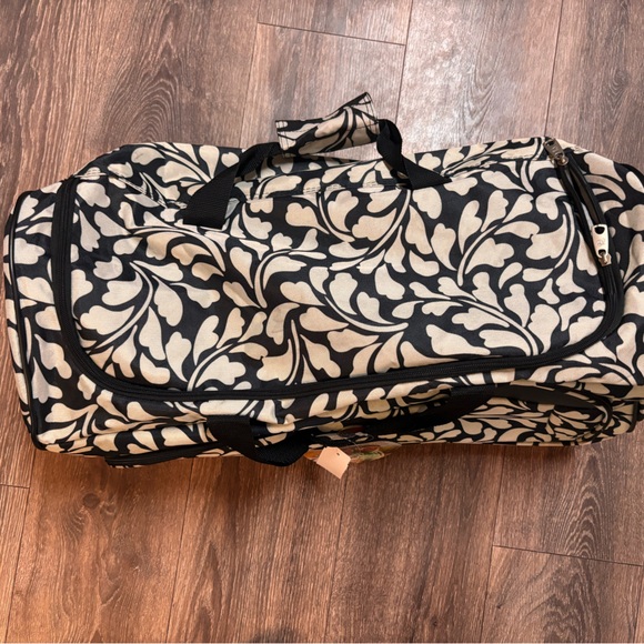 American Tourister Handbags - Black and White Patterned Duffel Bag